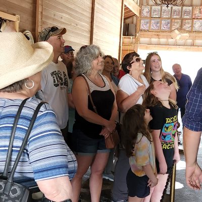 a group of people standing in front of a crowd